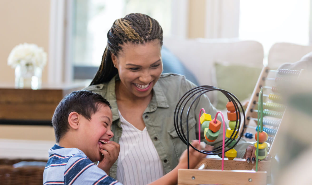 BCBA therapist playing games with an ABA therapy child